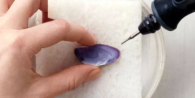How to drill a hole in a shell for jewelry?