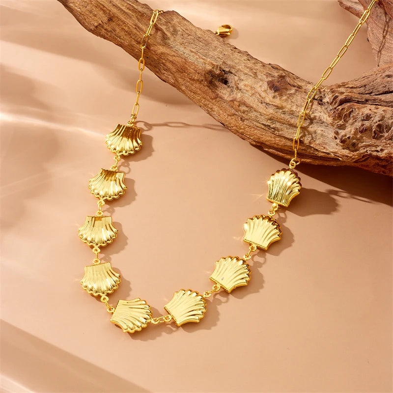 Gold sea shell necklace